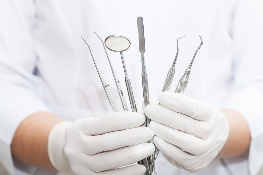 Dentist and dental tools-min